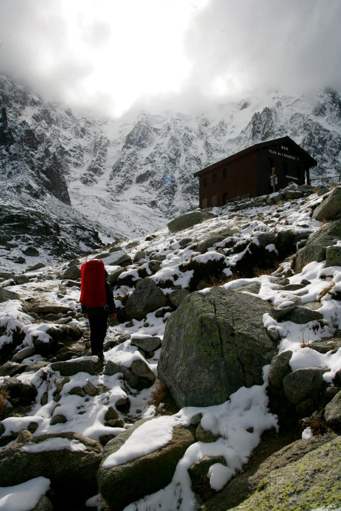 Planning hut-to-hut hikes 4 Hiker on the ascent just before a hut.