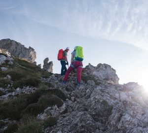 Easy via ferrata in the Alps: Two hikers on a via ferrata.