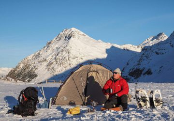Winter camping 18 Michael Bösiger in front of his Tatonka tent while winter camping in the Swiss mountains.