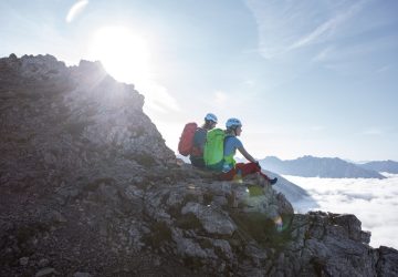 Overcoming fear of heights 4 Overcoming fear of heights: Two climbers sit on a rocky outcrop.